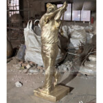 bronze golfer statue