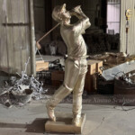 bronze golfer statue